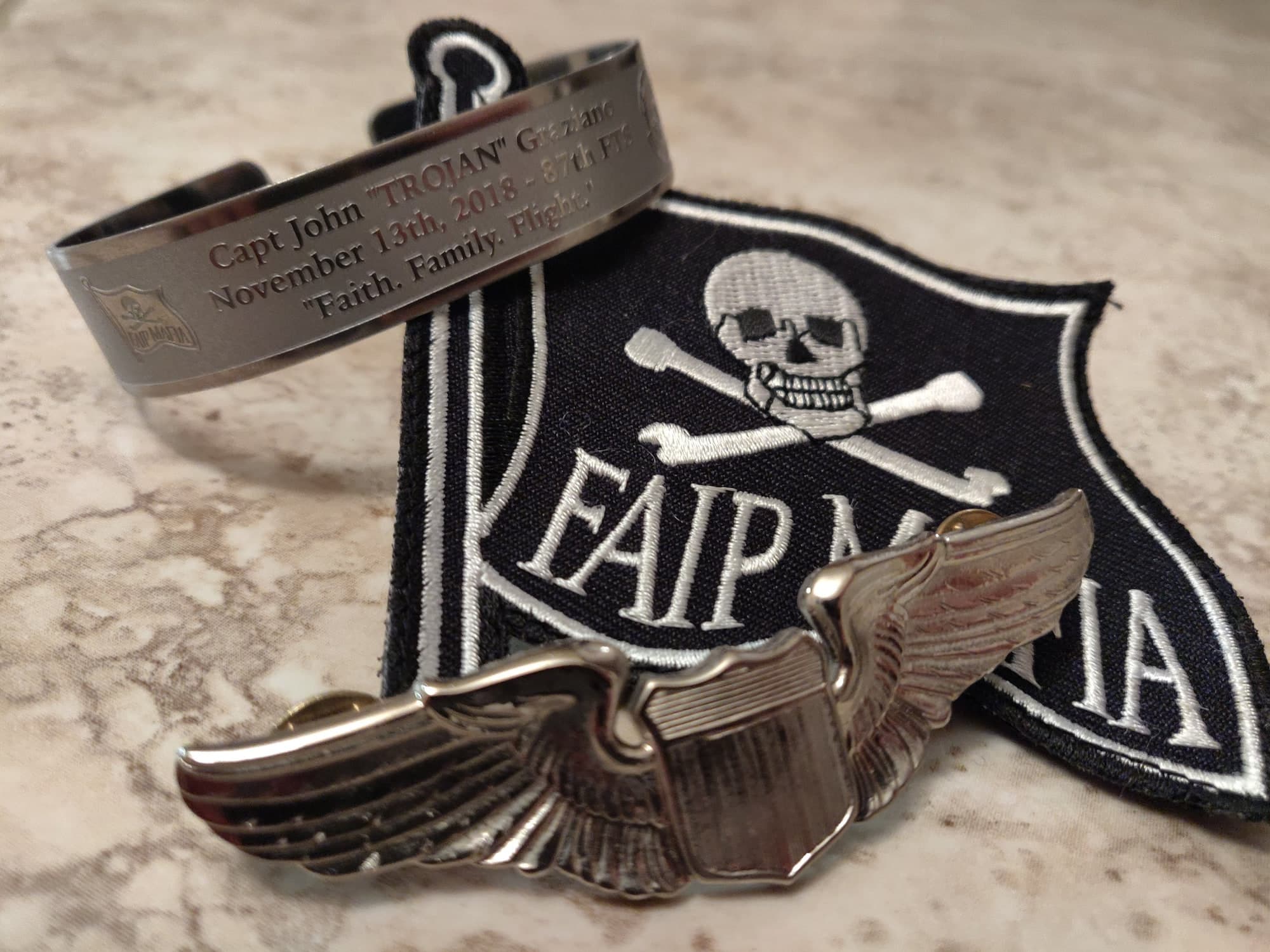 Memorial bracelet honoring Capt John "TROJAN" Graziano (USAF)