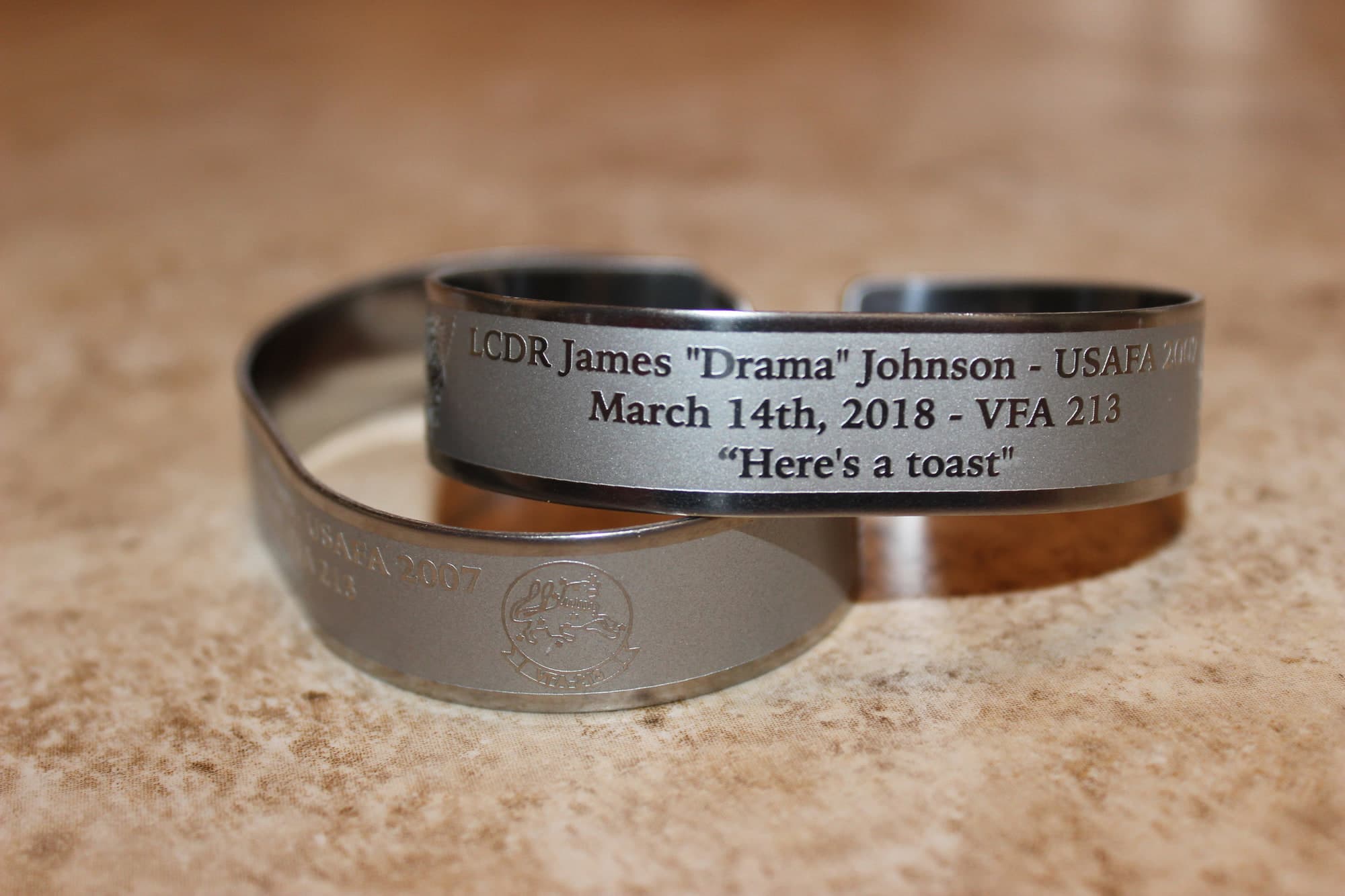 Memorial bracelet honoring LCDR J. Brice "Drama" Johnson (USAFA '07)