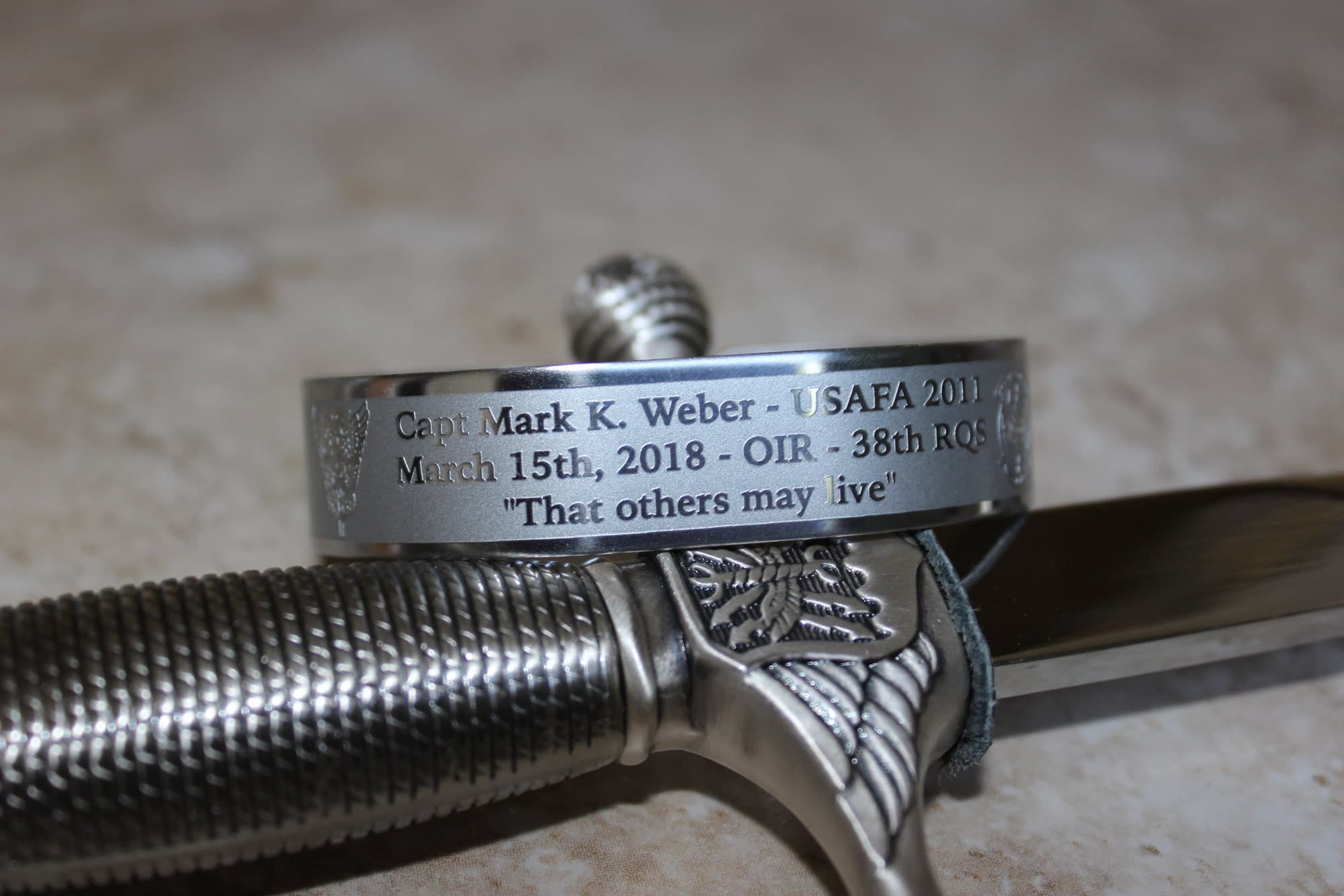 Memorial bracelet honoring Capt Mark K. Weber (USAFA '11)