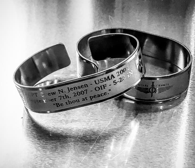 Memorial bracelet honoring CPT Drew N. Jensen (USMA '02)