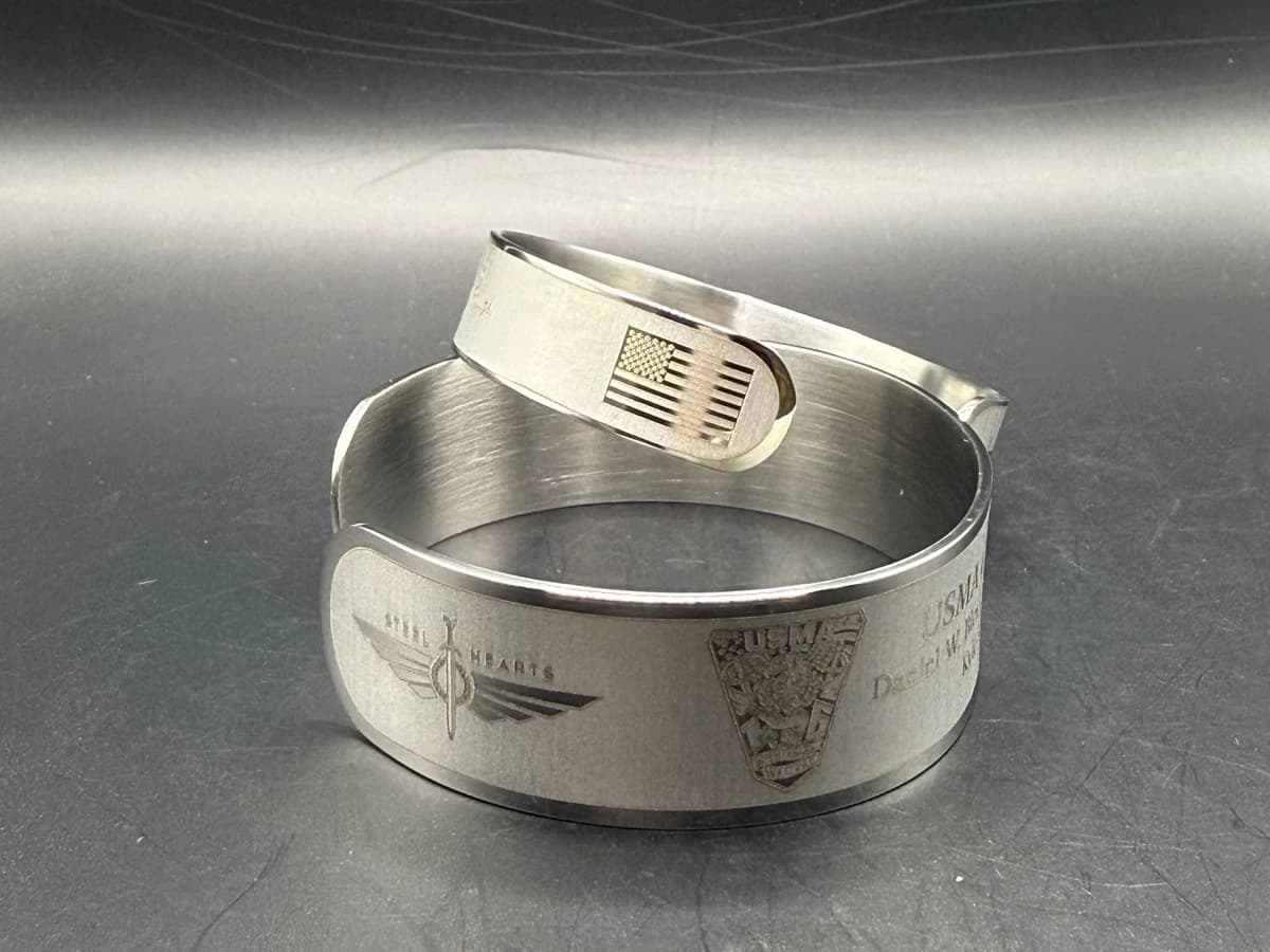 USMA Class of 2016 bracelets showing the Steel Hearts mark, class crest, and American flag.