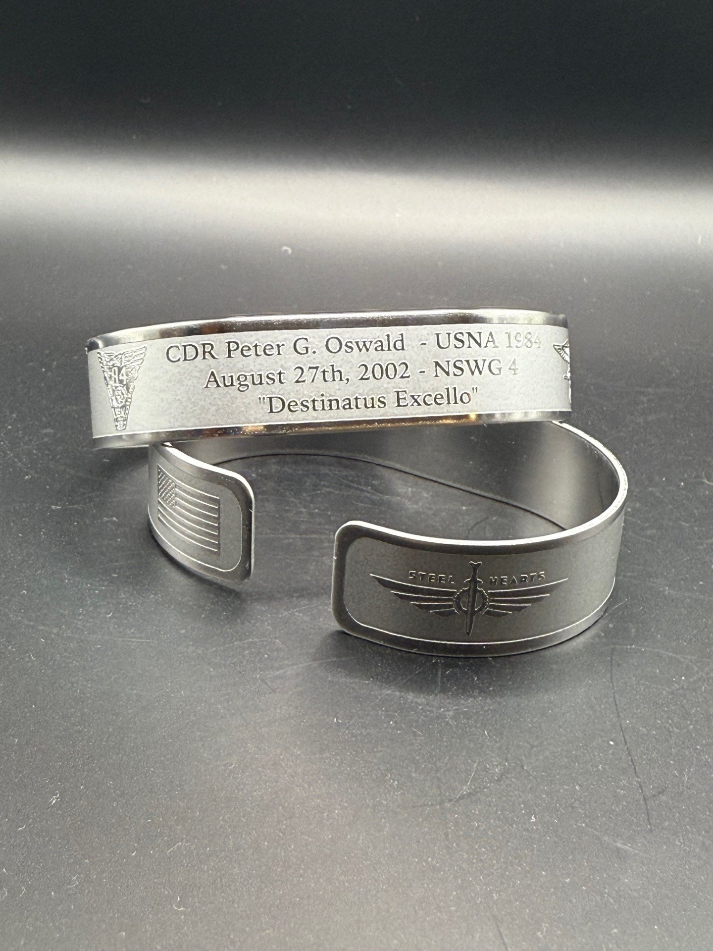 Memorial bracelet design for CDR Peter G. Oswald (USNA '84)
